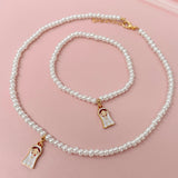 White Pearl Necklace and Bracelet Set with the Virgin Child Medal