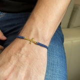 Woven Bracelet with Gold Steel Cross