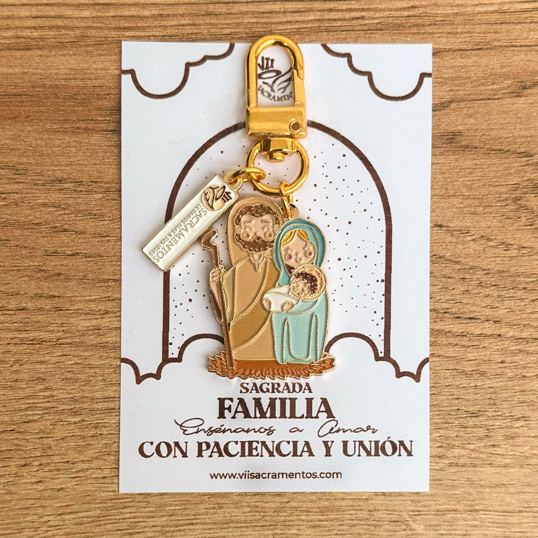 Holy Family - Sagrada Familia enamel keychain charm with carabiner clasp on illustrated presentation card — VII Sacramentos Catholic gifts from Colombia